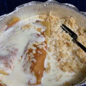 El Rancho Grande - Yummy beef Enchiladas with cheese sauce on top - Mexican Near Me - Dayton, Ohio El Rancho Grande - Yummy beef Enchiladas with cheese sauce on top - Mexican Near Me - Dayton, Ohio