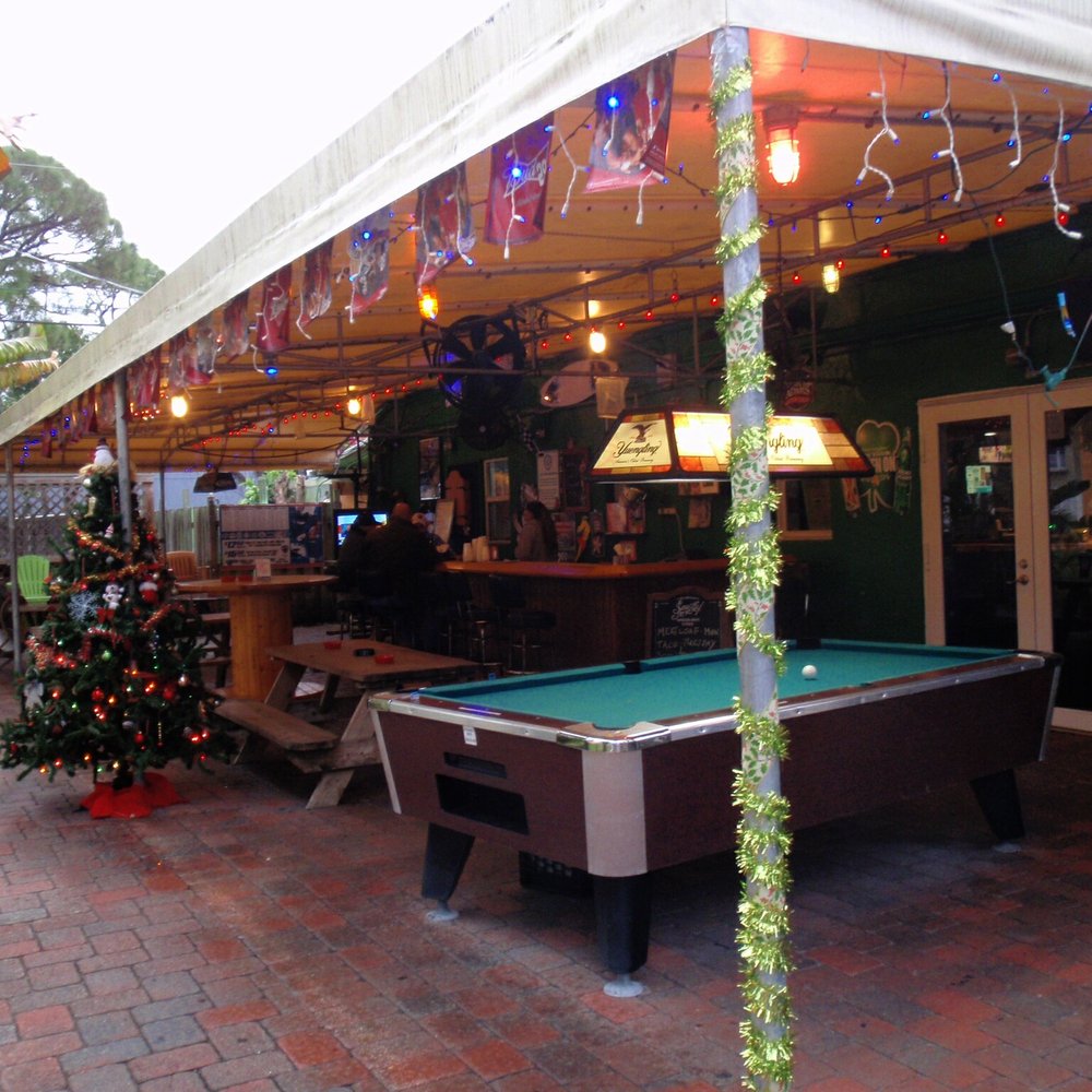 Big Dog Station - Outdoor patio and bar area - Sports Bars Near Me - Oakland Park, Florida Big Dog Station - Outdoor patio and bar area - Sports Bars Near Me - Oakland Park, Florida