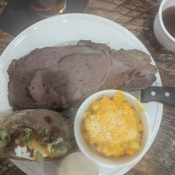 Brady's Steaks and Seafood - This is the prime rib with Mac and cheese with a loaded baked potato. - Seafood Near Me - Pascagoula, Mississippi Brady's Steaks and Seafood - This is the prime rib with Mac and cheese with a loaded baked potato. - Seafood Near Me - Pascagoula, Mississippi