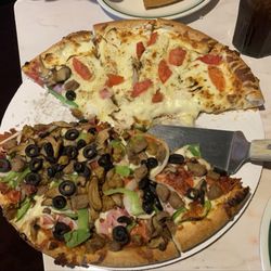 Stavros and Sons - Half Stavros Deluxe, half "White" with onions (special accommodation) large pizza