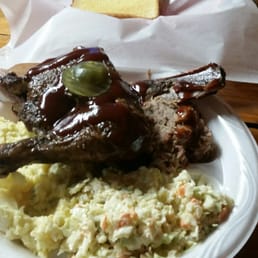 Combo plate (dark meat chicken, ribs, pork) potato salad, Cole slaw, garlic toast