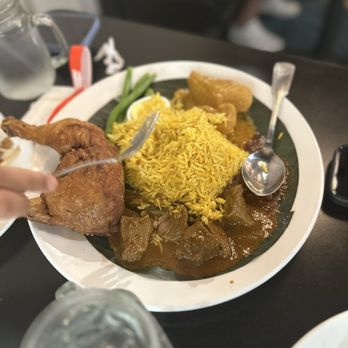 Mamak Malaysian Restaurant - Golden Rice with Fried Chicken Legg and Rendang Beef - Malaysian Near Me - Sugar Land, Texas Mamak Malaysian Restaurant - Golden Rice with Fried Chicken Legg and Rendang Beef - Malaysian Near Me - Sugar Land, Texas