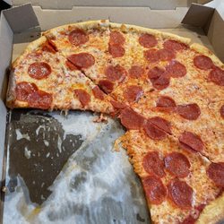 Attilio's Villagio Restaurant & Pizzeria - Greasy Pizza - probably from cheap cheese & pepperoni.