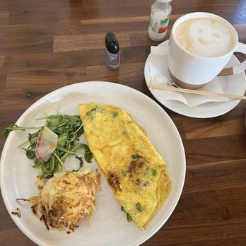 Adair Kitchen - Flay 2 egg omelette with Jalapeño and only one corner of chorizo. In the picture is also a caramel latte vanilla sugar-free - New American Near Me - Houston, Texas Adair Kitchen - Flay 2 egg omelette with Jalapeño and only one corner of chorizo. In the picture is also a caramel latte vanilla sugar-free - New American Near Me - Houston, Texas