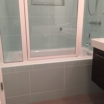 No Limit Glass - Installation of swing door in a small bathroom - Glass & Mirrors Near Me No Limit Glass - Installation of swing door in a small bathroom - Glass & Mirrors Near Me