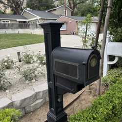 Handy Serge - I also fixed the mailbox and concreted the foundations for it