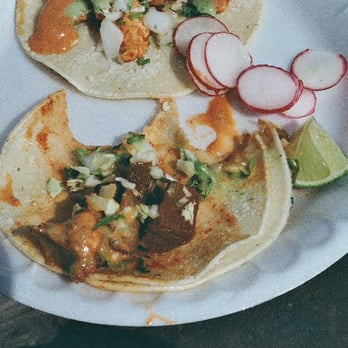 Pastorcillos Tacos - two tacoss on a paper plate - Food Trucks Near Me - Newberg, Oregon