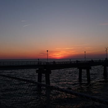 Chesapeake Bay Bridge Tunnel - Sunset with the pier in the background- west - Landmarks & Historical Buildings Near Me - Cape Charles, Virginia Chesapeake Bay Bridge Tunnel - Sunset with the pier in the background- west - Landmarks & Historical Buildings Near Me - Cape Charles, Virginia