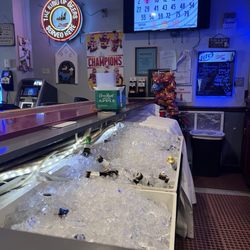 Doghouse Bar & Grille - Nothing beats truly "ice" cold! Every beer you get is frosty!