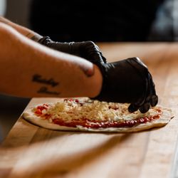 Smokin' Oak Wood-Fired Pizza & Taproom - Hand-tossed pizzas made with never-frozen ingredients.