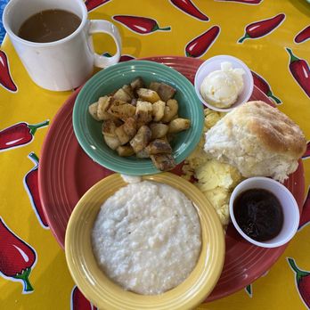 The Flying Biscuit Cafe - Egg breakfast with grits, potatoes and a biscuit. - Southern Near Me - Kingwood, Texas The Flying Biscuit Cafe - Egg breakfast with grits, potatoes and a biscuit. - Southern Near Me - Kingwood, Texas