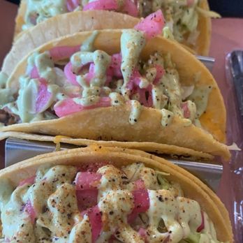 JNeely's Burrito Bar - My order; steak tacos with pickled onions; corn salsa; lettuce; avocado sauce; cheese. - Bars Near Me - Belton, Texas JNeely's Burrito Bar - My order; steak tacos with pickled onions; corn salsa; lettuce; avocado sauce; cheese. - Bars Near Me - Belton, Texas