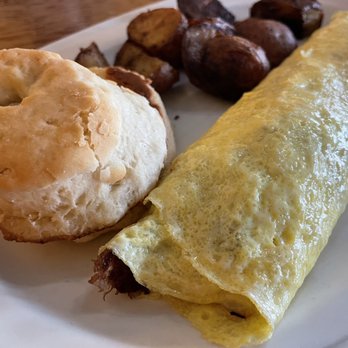 The Bayou Kitchen - The Smokin ' Caterpillar with homemade hash onions and swiss on the inside. Potatoes and a biscuit - Breakfast & Brunch Near Me - Portland, Maine The Bayou Kitchen - The Smokin ' Caterpillar with homemade hash onions and swiss on the inside. Potatoes and a biscuit - Breakfast & Brunch Near Me - Portland, Maine