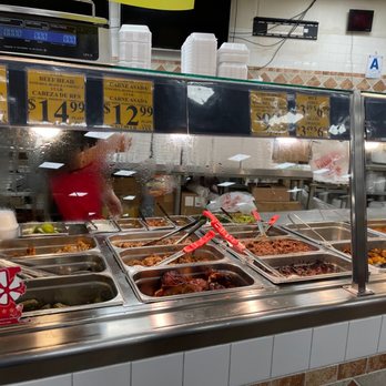 Carnival Supermarket - a buffet with a variety of food items - Grocery Near Me - San Diego, California