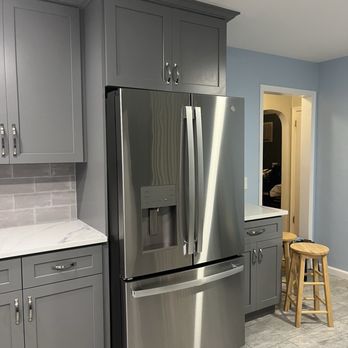 L&B Construction - New bottom and top cabinets with crown molding all around and porcelain tile floor. - Roofing Near Me - Union City, New Jersey L&B Construction - New bottom and top cabinets with crown molding all around and porcelain tile floor. - Roofing Near Me - Union City, New Jersey