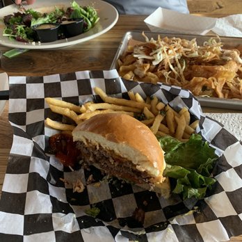 Gettin' Basted - Black and bleu salad top left, cheeseburger in middle, and nachos top right. - Barbeque Near Me - Branson, Missouri