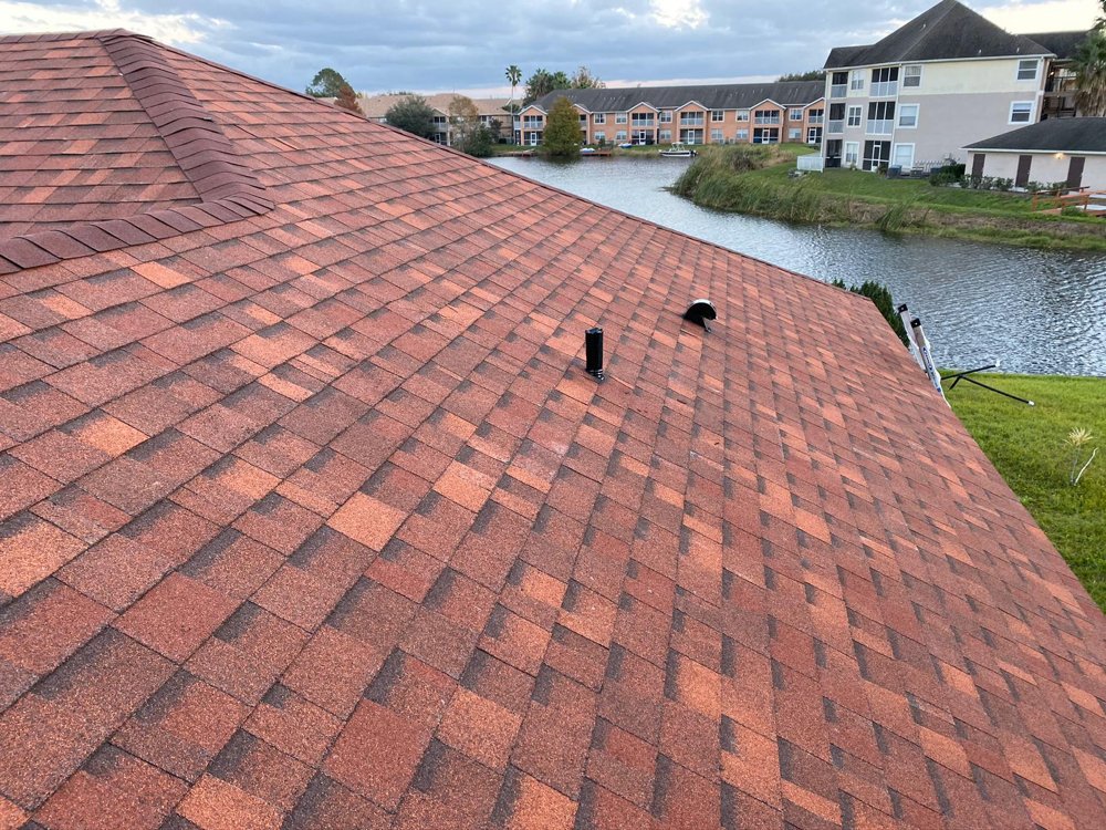 Slide of A2M Roofing