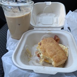 Biscuit w/ fried egg, bacon and white cheddar Medium cold latte = $8.97 Biscuit w/ fried egg, bacon and white cheddar Medium cold latte = $8.97