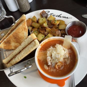 Cafe Patachou - Side of cinnamon toast, cup of tomato artichoke soup, side of breakfast potatoes - Breakfast & Brunch Near Me - Indianapolis, Indiana