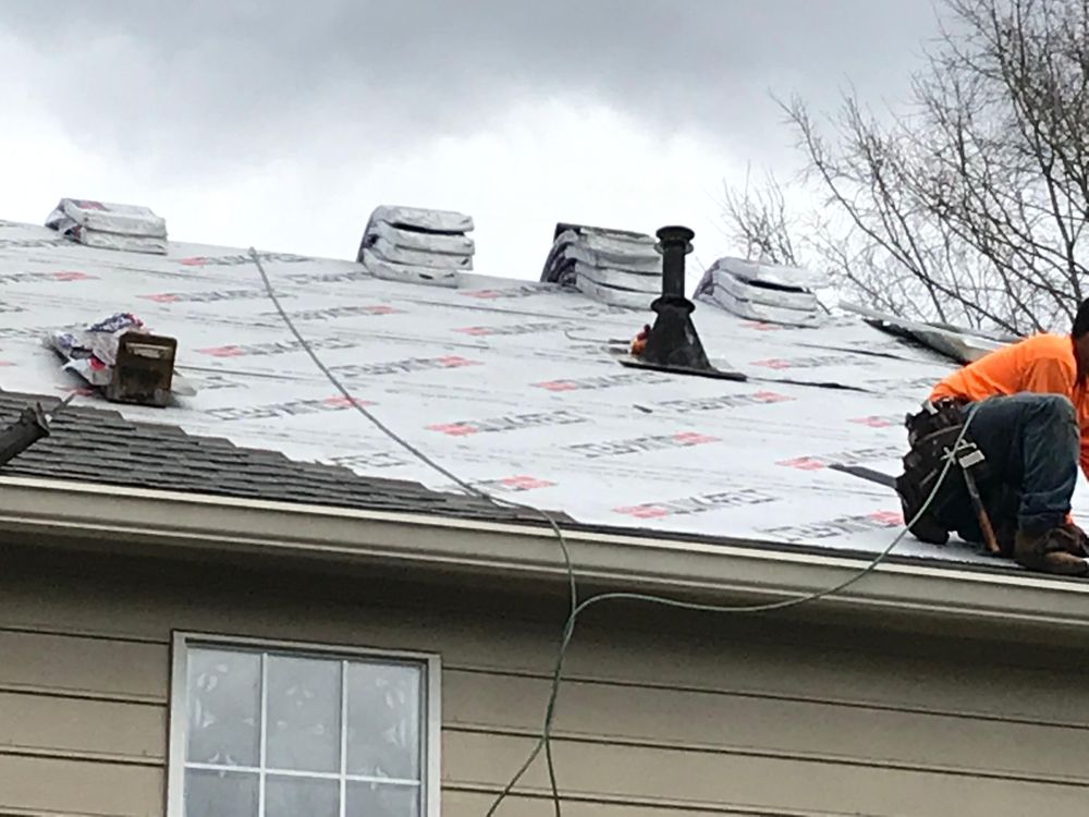 Slide of Artech Roofing & Construction