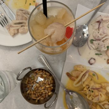 CVI.CHE 105 - Canchitas, passion fruit sangria and ceviche. - Peruvian Near Me - Miami, Florida CVI.CHE 105 - Canchitas, passion fruit sangria and ceviche. - Peruvian Near Me - Miami, Florida
