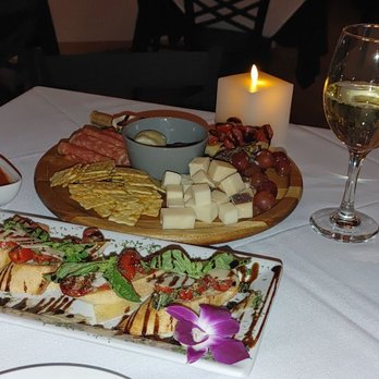 Pietro's - Charcuterie board and caprese salad with reisling. - Italian Near Me - Fountain Hills, Arizona Pietro's - Charcuterie board and caprese salad with reisling. - Italian Near Me - Fountain Hills, Arizona