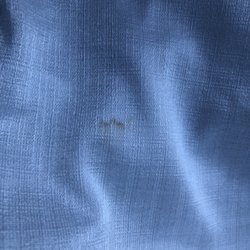 Ok Cleaner & Alteration - The stain they caused while fixing my zipper on my white dress.