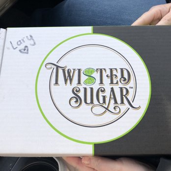 Twisted Sugar - a person holding a box of twisted sugar - Desserts Near Me - Spokane, Washington