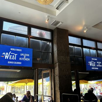 West Saloon & Kitchen - Signage, 16th street vibe, outdoor tables and misters in summer. - American Near Me - Denver, Colorado West Saloon & Kitchen - Signage, 16th street vibe, outdoor tables and misters in summer. - American Near Me - Denver, Colorado