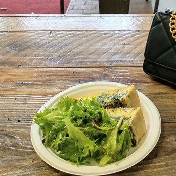 Foreigner - The most delicious spinach and mushroom quiche with fresh organic salad and grated parmesan - Breakfast & Brunch Near Me - San Mateo, California Foreigner - The most delicious spinach and mushroom quiche with fresh organic salad and grated parmesan - Breakfast & Brunch Near Me - San Mateo, California