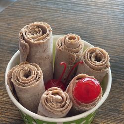 Chocolate ice cream with peanut butter and cherries.