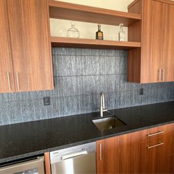 Foxs Tile & Flooring - Tile backsplash in the game room bar.