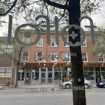 Folfol By Damas - a tree in front of a building - Syrian Near Me - Montreal, Quebec