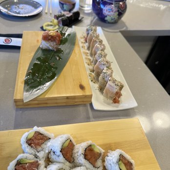 Tamashi Westside - The spread!! spicy tuna roll, Sesame Street roll, 1 piece of the Red Rock appetizer, tuna maki roll and the cute teapot! - Japanese Near Me - Albuquerque, New Mexico