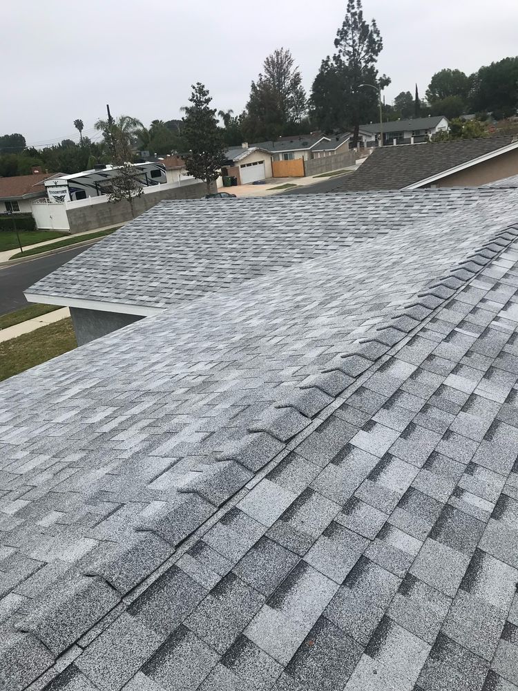 Slide of Mencho's Roofing & Repairs