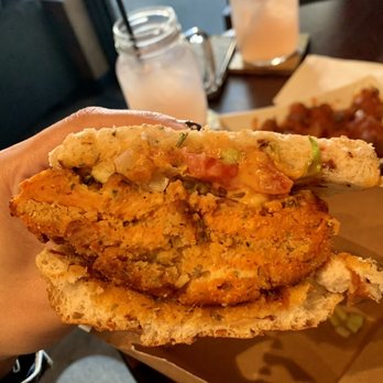 Wisdom Bakery & Cafe - Half of a spicy chick'n sandwich - Vegan Near Me - Spring, Texas