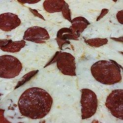 Revana Pizza - Some like it cold, some like it hot, some like it when the pepperonis on top
