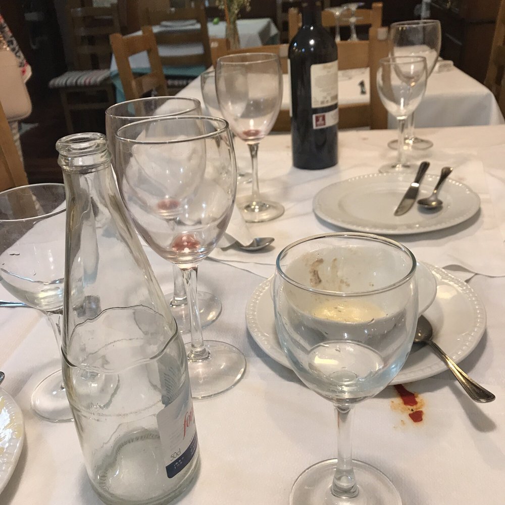 Pollitena - The remains of a great night with family and friends. Izaskun, the owner, is just visible in the background. - Spanish Near Me - Donostia-san Sebastian, SS