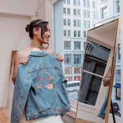 Janene's Bridal Boutique - Bride in a wedding dress San Francisco denim jack Wife