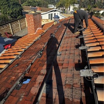 Jamar Power Systems - Camilo hard at work. He works super fast and was done in just a little over 4 hours. Not bad for 20 panel and microinverters replacements. - Solar Installation Near Me - Santee, California