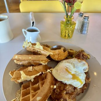 Smothered - Chicken and waffles with over easy egg - Breakfast & Brunch Near Me - Albuquerque, New Mexico