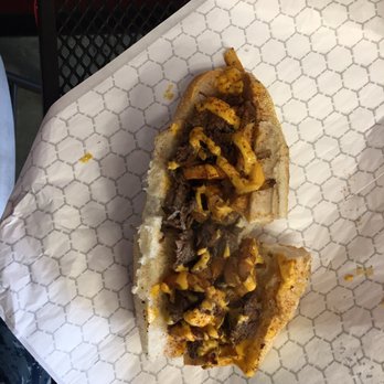 Jeno's Steaks - Schubaka cheesesteak. Ribeye with old bay fries layered in. - Cheesesteaks Near Me - Severna Park, Maryland Jeno's Steaks - Schubaka cheesesteak. Ribeye with old bay fries layered in. - Cheesesteaks Near Me - Severna Park, Maryland