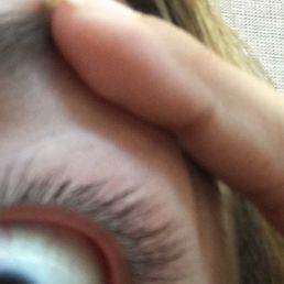 It's blurry but you can see the little part of my eyelashes she cut off!!! -.-