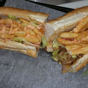 Romans Restaurant and Ccuchifritos - two sandwiches with fries - Puerto Rican Near Me - Pittsfield, Massachusetts Romans Restaurant and Ccuchifritos - two sandwiches with fries - Puerto Rican Near Me - Pittsfield, Massachusetts
