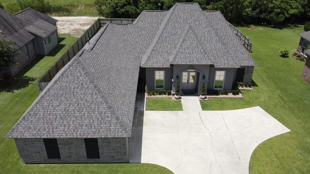 Slide of Signature Roofing & Construction