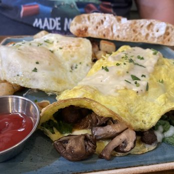 First Watch - Short rib omelet with over easy eggs on the hash - Breakfast & Brunch Near Me - Webster, Texas