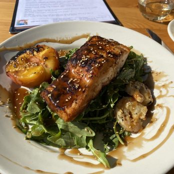Chef Rick's - Highly recommend the salmon, shrimp, pear (or peach if I season) salad, served a bed of arugula with sesame seed glaze - New American Near Me - Orcutt, California Chef Rick's - Highly recommend the salmon, shrimp, pear (or peach if I season) salad, served a bed of arugula with sesame seed glaze - New American Near Me - Orcutt, California