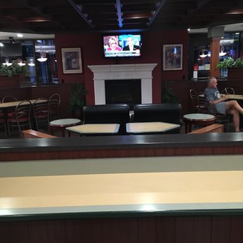 McDonald's - a man sitting at a table in a restaurant - Fast Food Near Me - Elkhart, Indiana McDonald's - a man sitting at a table in a restaurant - Fast Food Near Me - Elkhart, Indiana