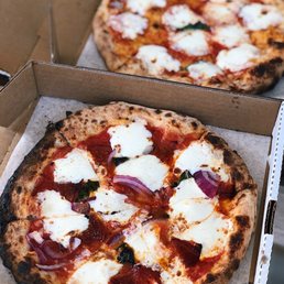 two pizzas in a box