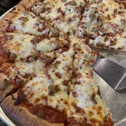 Upper Crust Pizza & Wings - Meat pizza.